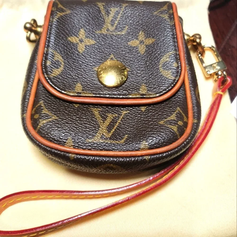 Louis Vuitton Pochette Cancun Monogram Mini Bag